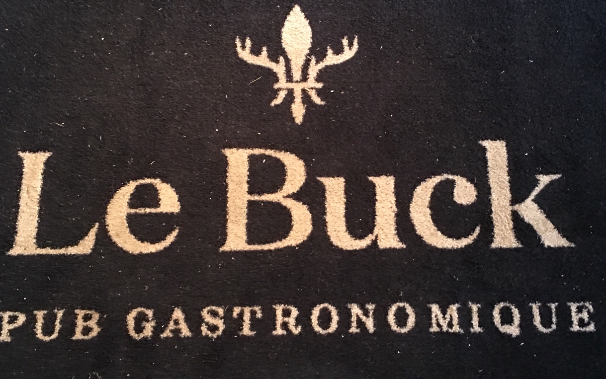 Le pub Le Buck, un établissement gastronomique de Trois-Rivières, est représenté par son logo distinctif.