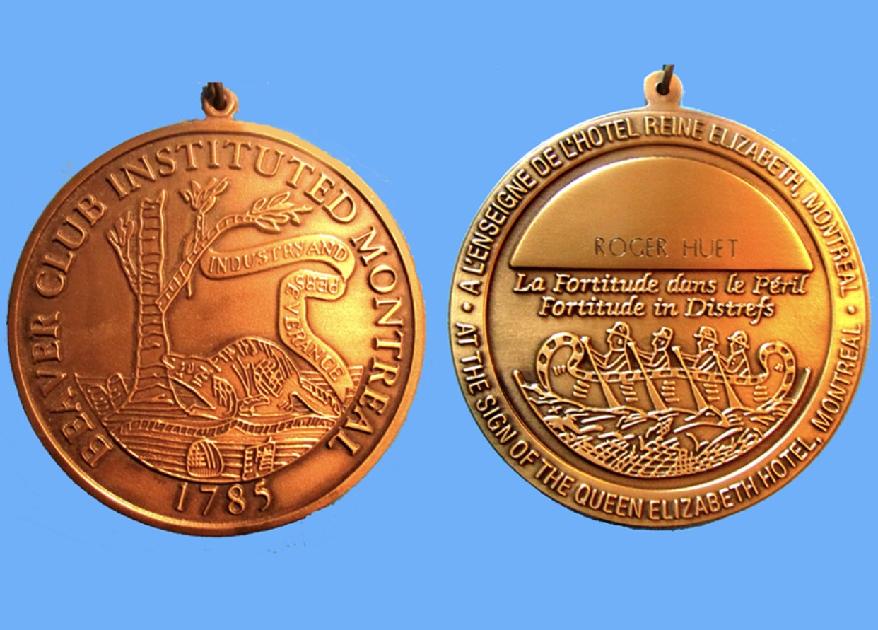 Deux médailles de bronze sur fond bleu figurant la Gastronomie.