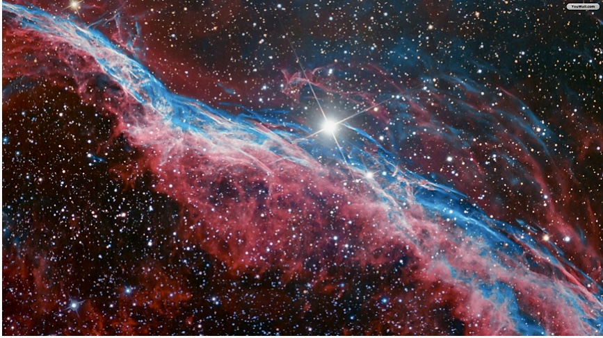 Une image fascinante d’une nébuleuse entourée d’innombrables étoiles scintillantes qui évoque un sentiment de philosophie spirituelle.