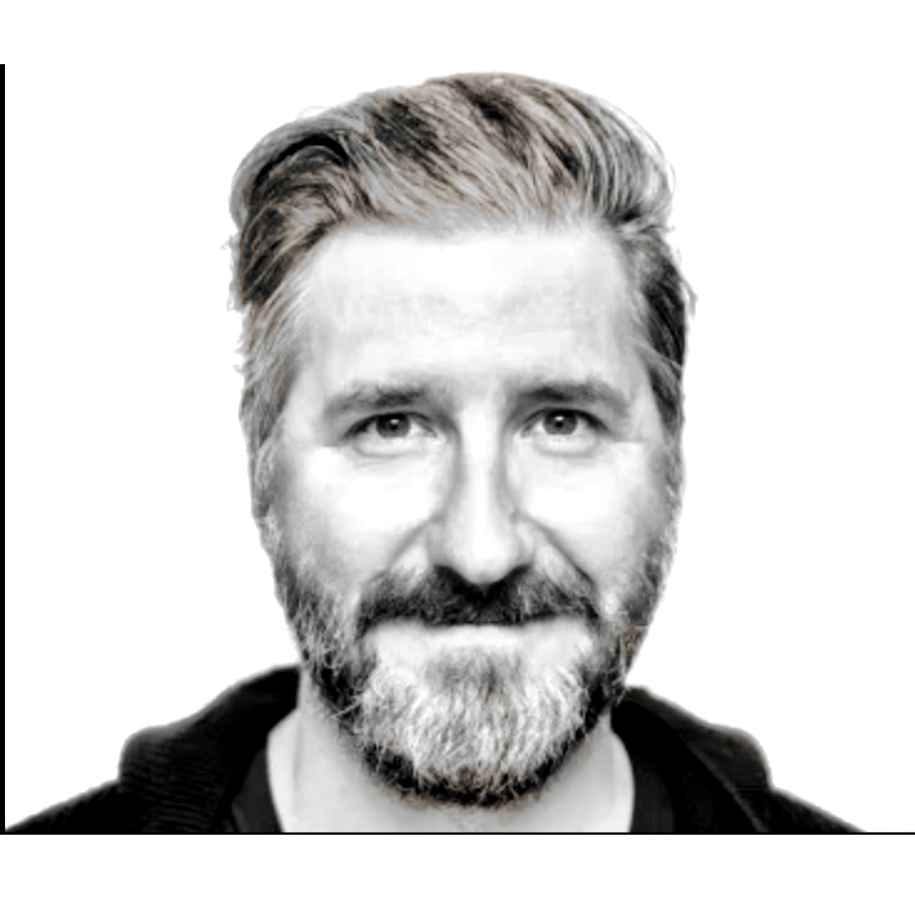 Une photo en noir et blanc d'un homme barbu.