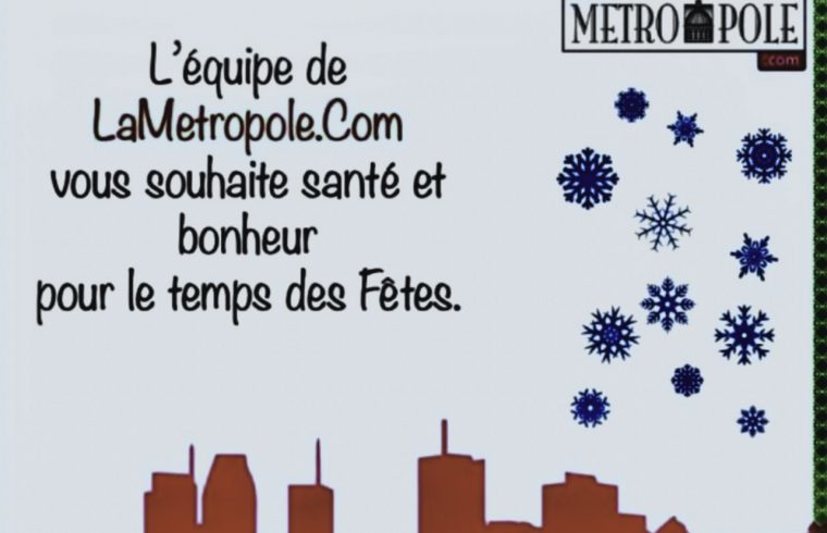 Une ville avec des flocons de neige et un panneau indiquant la métropole com, où prennent vie les souhaits sportifs pour 2023.