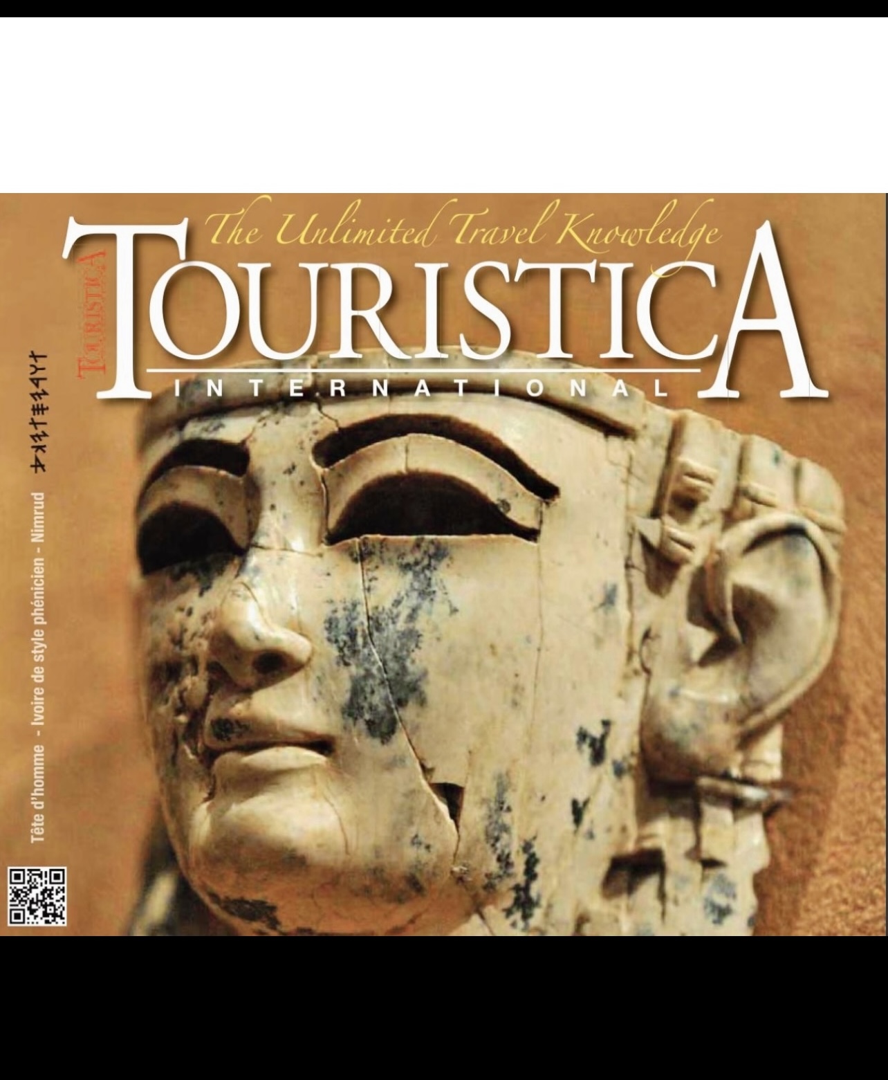 La couverture du magazine Touristica présente l'image d'une tête égyptienne, mettant en valeur la riche histoire et la culture des Phéniciens.