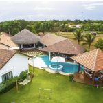 Une vue aérienne d'une casa avec une piscine à Casa de Campo en République Dominicaine.